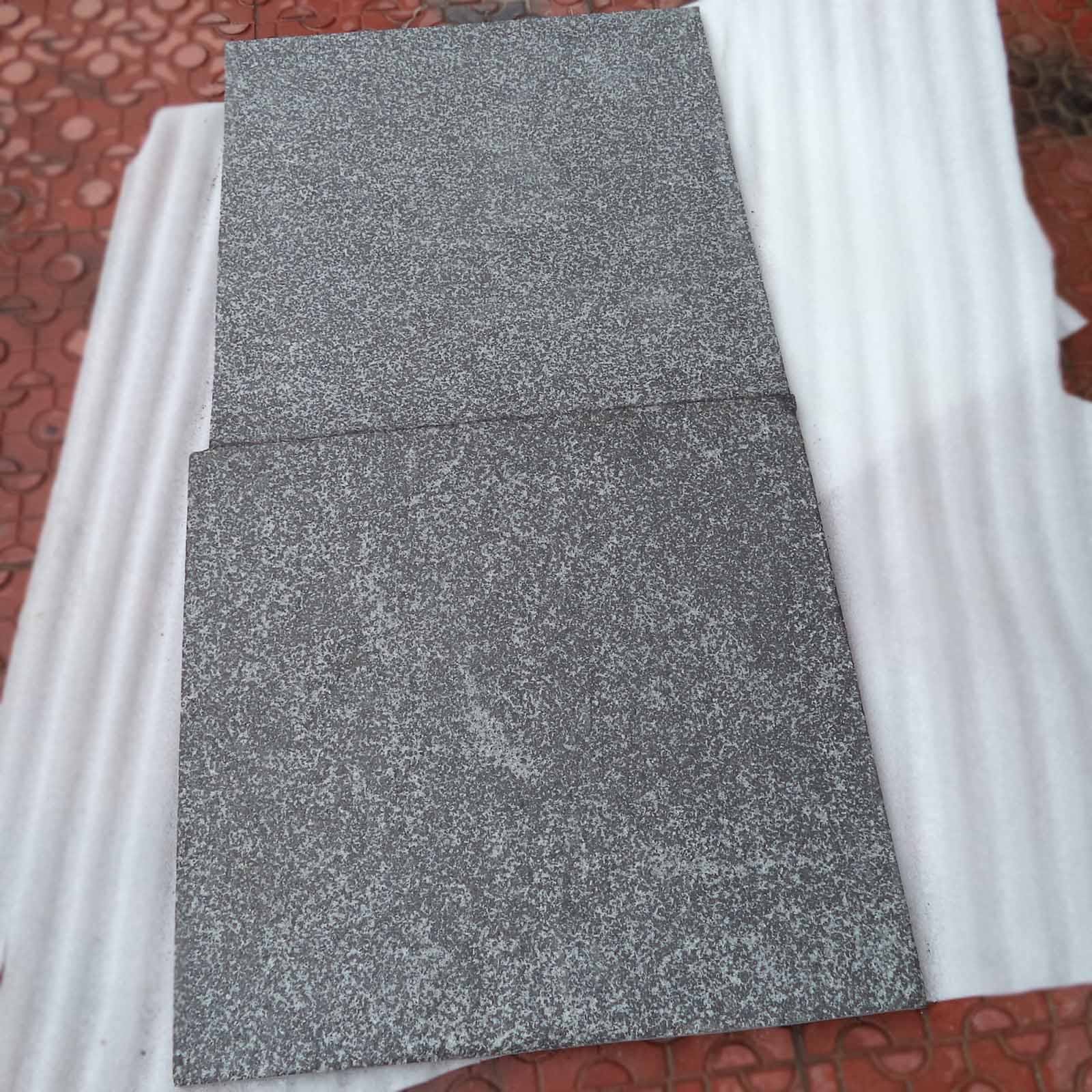 Impala black granite tiles