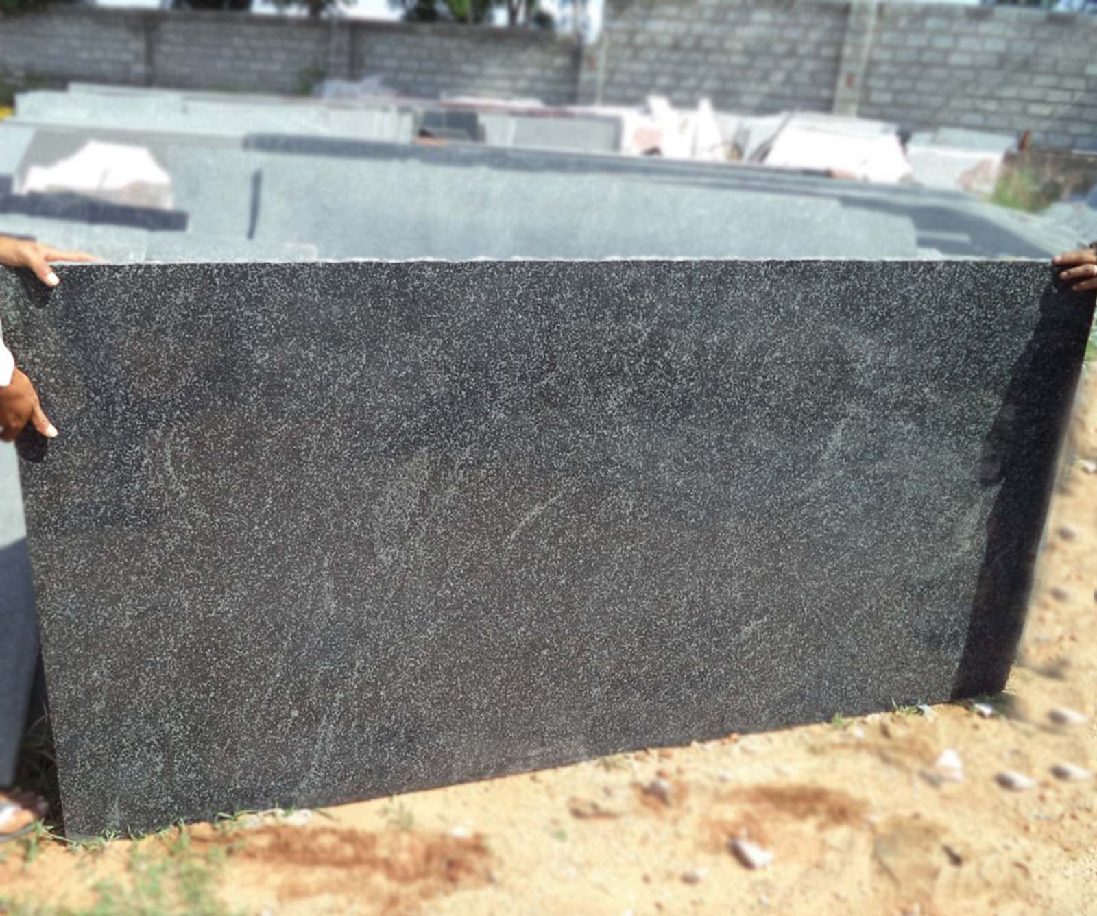 Impala black granite cutter slab